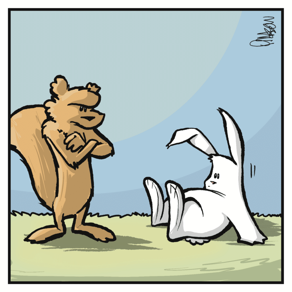 The rabbit sits halfway up and thinks.