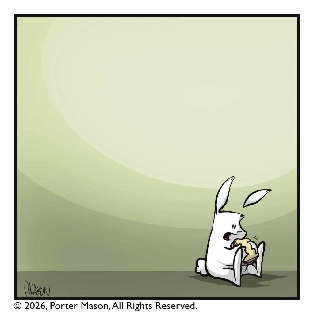 The rabbit, alone, take a bite of the sandwich.